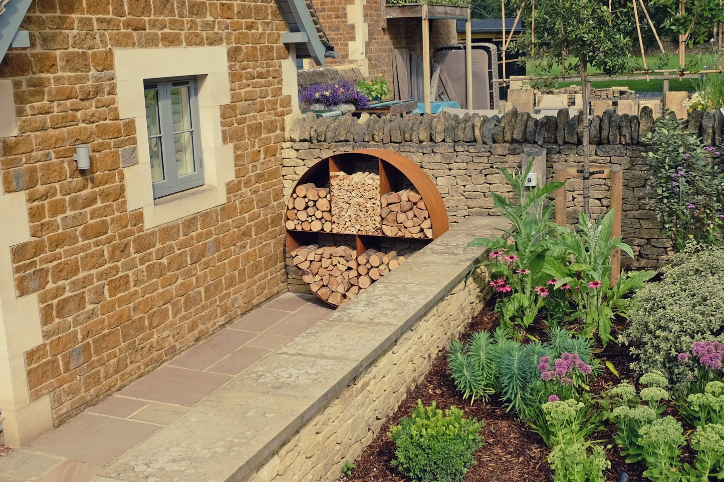 CORTEN STEEL CIRCULAR LOG STORE
